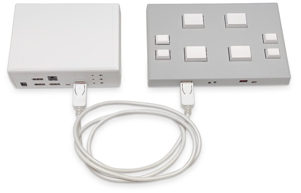 An RB-844 response pad connected to a StimTracker.